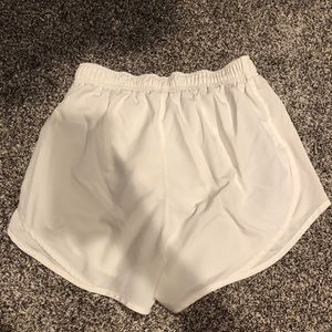 White Nike shorts